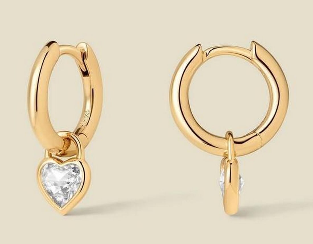 Gold Vermeil CZ Heart Hoop Earrings: Gold Vermeil CZ Heart Hoop Earrings These gold vermeil hoops feature a delicate heart-shaped cubic zirconia that catches the light with every movement, adding a subtle, romantic touch. Lightweight