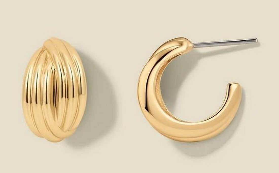 14k Gold Plated Twisted Hoop Earrings: 14k Gold Plated Twisted Hoop Earrings These hoops feature overlapping curves and a subtle polished shine, offering a modern twist on a classic silhouette. Crafted in 14k gold plated brass, they