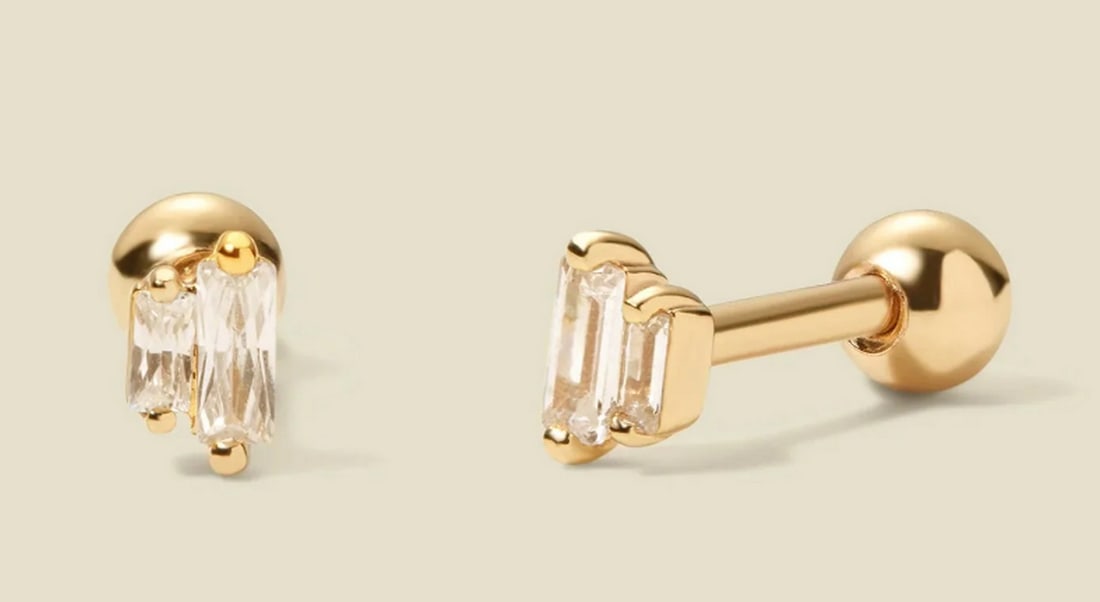 Vermeil Gold & Double Baguette CZ Stud Earrings: Vermeil Gold & Double Baguette CZ Stud Earrings Enhance your shine with this dazzling pair of earrings, each adorned with two prong-set baguette CZs for a radiant finishing touch. Designed for all
