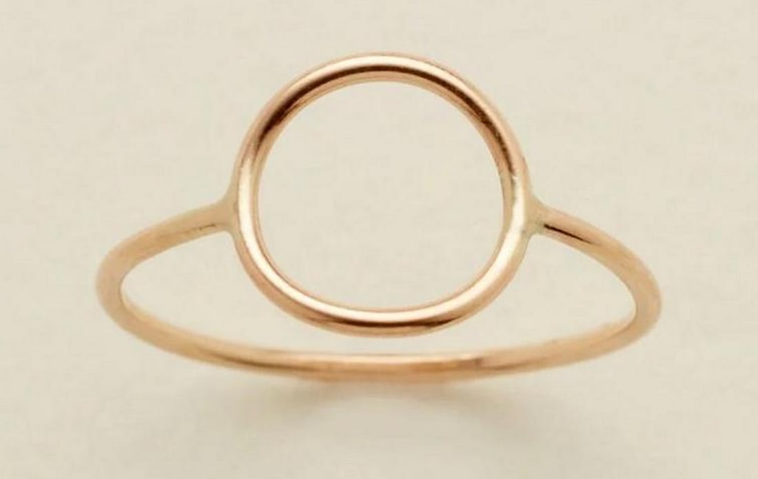 Equinox Circle Ring - Size 6: Equinox Circle Ring - Size 6 Embody the perfect blend of minimalism and meaning with the Equinox Ring. A sleek, stackable band that adds subtle dimension to any look, it serves as a reminder that the