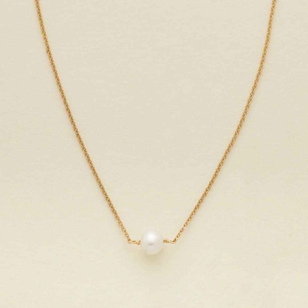 Solstice Pearl Choker: Solstice Pearl Choker Graceful and refined, this delicate choker features a single luminous pearl on a fine gold chain—a symbol of strength, resilience, and beauty. Effortlessly elegant, it’s a