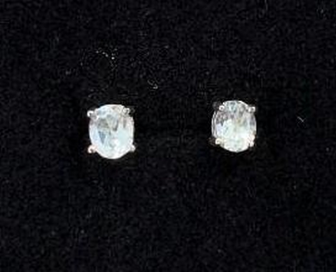 Sterling Silver Stud Earrings: Sterling Silver Stud Earrings Elevate your everyday style with these timeless sterling silver stud earrings, featuring a sparkling clear stone that catches the light beautifully. Simple, elegant, and