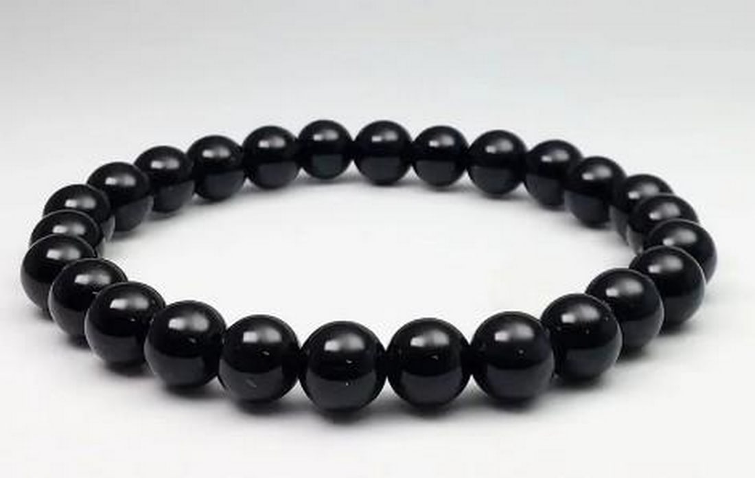 Midnight Black Onyx Bracelet: Midnight Black Onyx Bracelet Bold and sophisticated, this black onyx beaded bracelet exudes timeless elegance. Each smooth, polished bead showcases the deep, velvety black of onyx, a stone known for