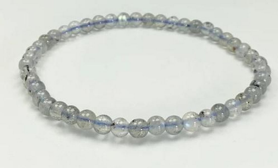 Mystic Aura Labradorite Bracelet: Mystic Aura Labradorite Bracelet. This enchanting beaded bracelet showcases the mesmerizing beauty of Labradorite. Revered as the "Stone of Magic," Labradorite is believed to enhance