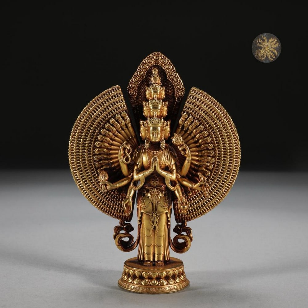 Bronze Thousand-Armed Guanyin Statue: Bronze Thousand-Armed Guanyin Statue This exquisite gilt bronze statue inspired by Ming Dynasty depicts the Thousand-Armed Guanyin, the Bodhisattva of Compassion, rendered with remarkable precision an