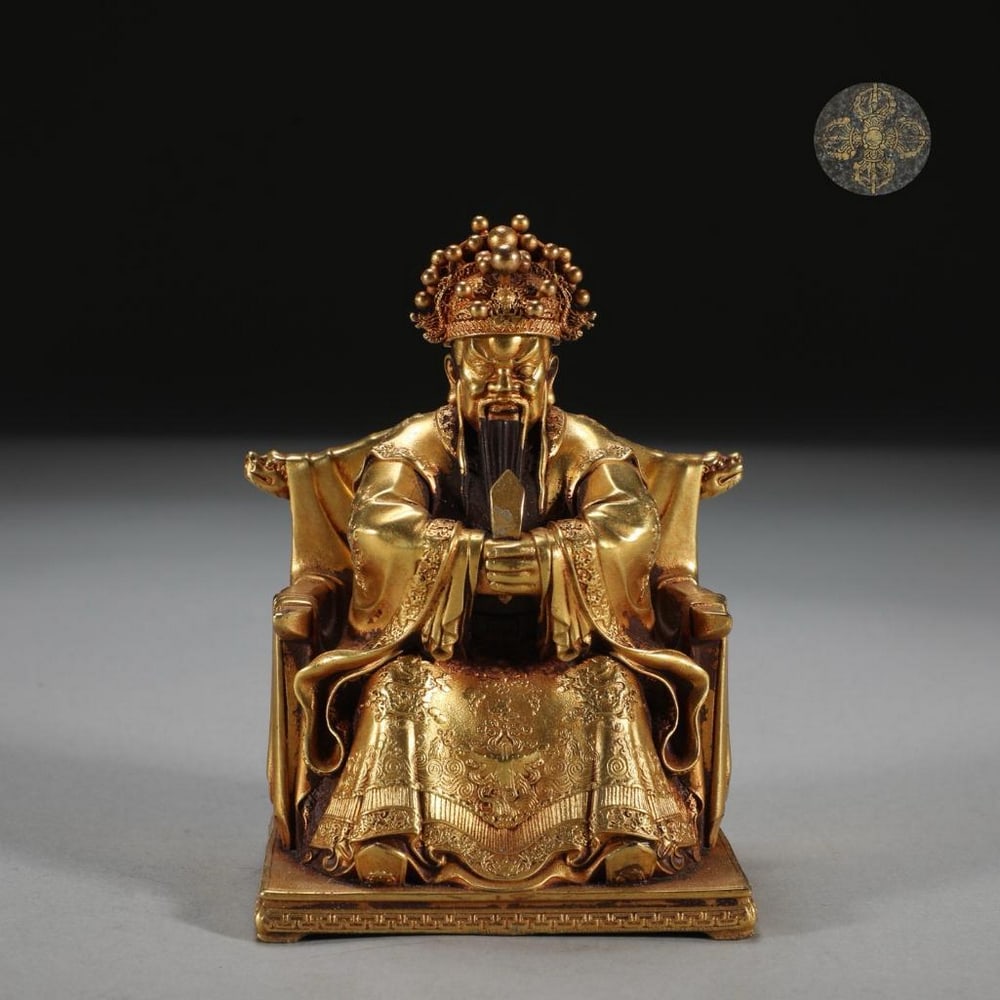 Bronze Dragon Master Sitting Statue: Bronze Dragon Master Sitting Statue This remarkable gilt bronze statue inspired by Ming Dynasty features the Dragon Master seated in a commanding yet composed posture, embodying mystical authority and