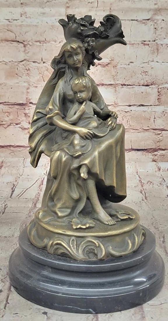 Mother Holding Child Original Bronze Statue - 10.5" x 6": Mother Holding Child Original Bronze Statue - 10.5" x 6" This elegant bronze sculpture by Milo beautifully captures the essence of compassion and nurturing. Its sleek, minimalist design featur