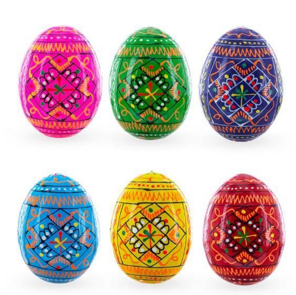 Painted Heritage Geometric Pysanky Eggs.: Painted Heritage Geometric Pysanky Eggs. A fusion of tradition and artistry, this set of 6 handcrafted wooden pysanky eggs captures the essence of Ukrainian folklore. Each egg is adorned with bold