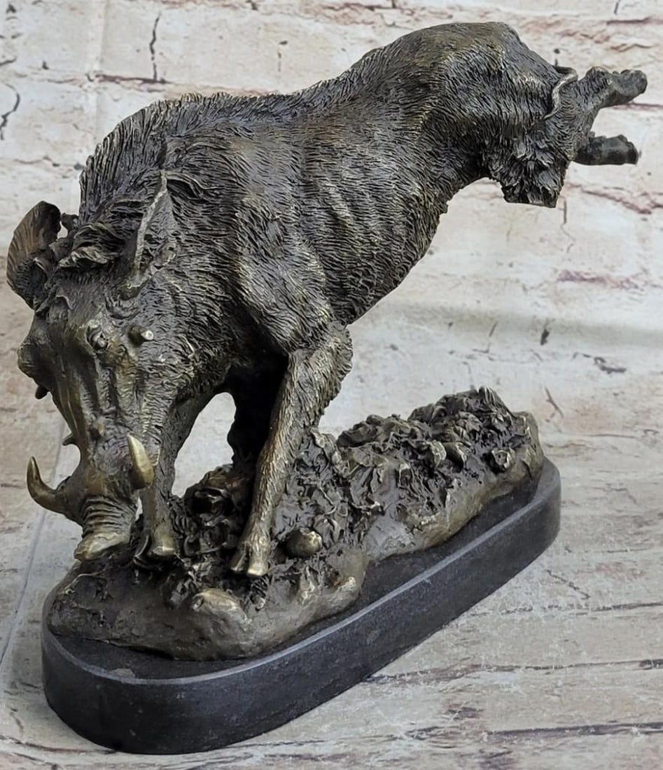Barye Inspired Wild Kicking Boar Bronze Sculpture - 8" x 12": Barye Inspired Wild Kicking Boar Bronze Sculpture - 8" x 12" Experience the power and majesty of the wild boar with this stunning bronze sculpture. The boar's compact body and large head c