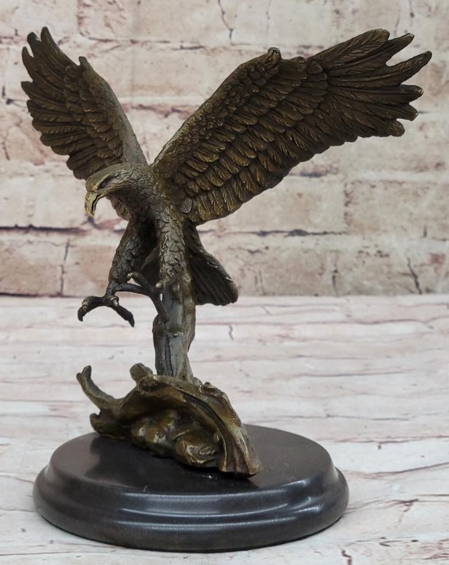 Bronze Eagle Inspired Sculpture by Barye - 8" x 9": Bronze Eagle Inspired Sculpture by Barye - 8" x 9" This captivating bronze sculpture by the renowned artist Barye beautifully captures a small eagle descending with grace and power, poised for