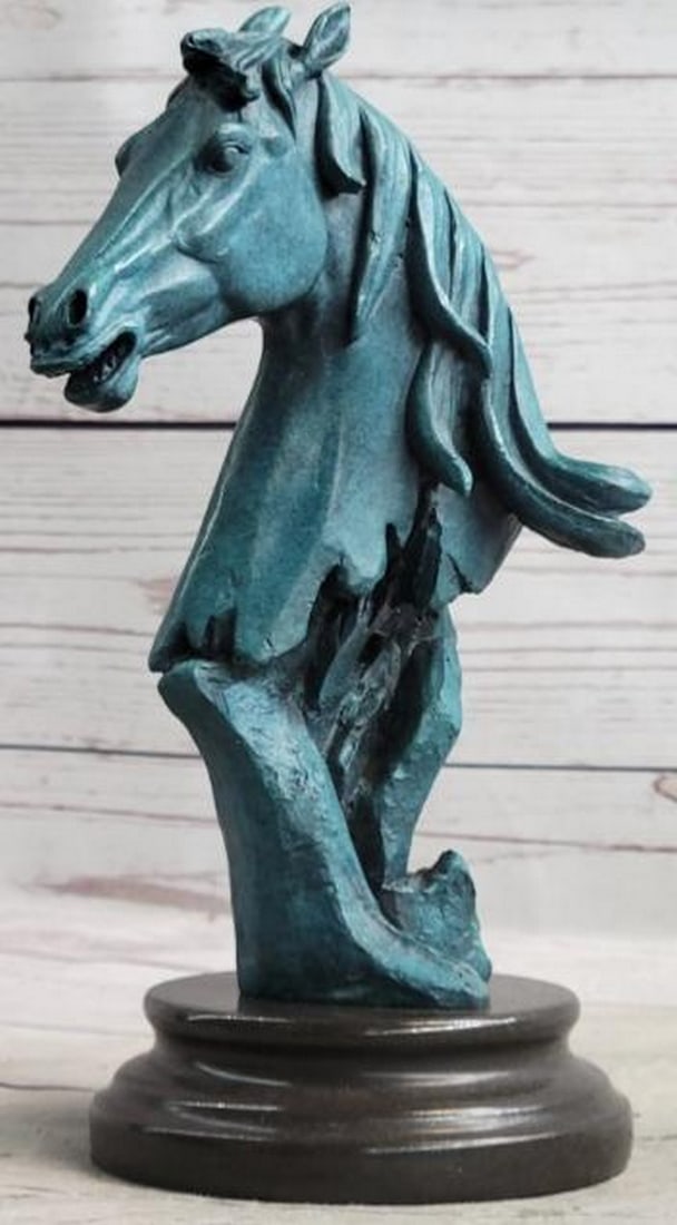 Horse Bust Bronze Sculpture: Horse Bust Bronze Sculpture This striking bronze sculpture presents a detailed bust of a horse, capturing the strength, grace, and intelligence of the animal in a timeless portrait. The head is