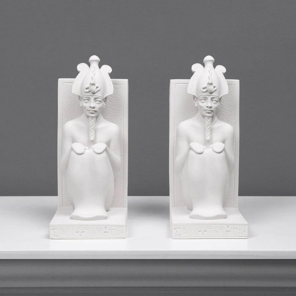 Egyptian Bookend Set: Osiris Statue Pair - (3.3lbs): Egyptian Bookend Set: Osiris Statue Pair - (3.3lbs) Enhance the timeless elegance of your bookshelf with our Egyptian Bookend Set featuring the revered god Osiris. Symbolizing fertility, agriculture,