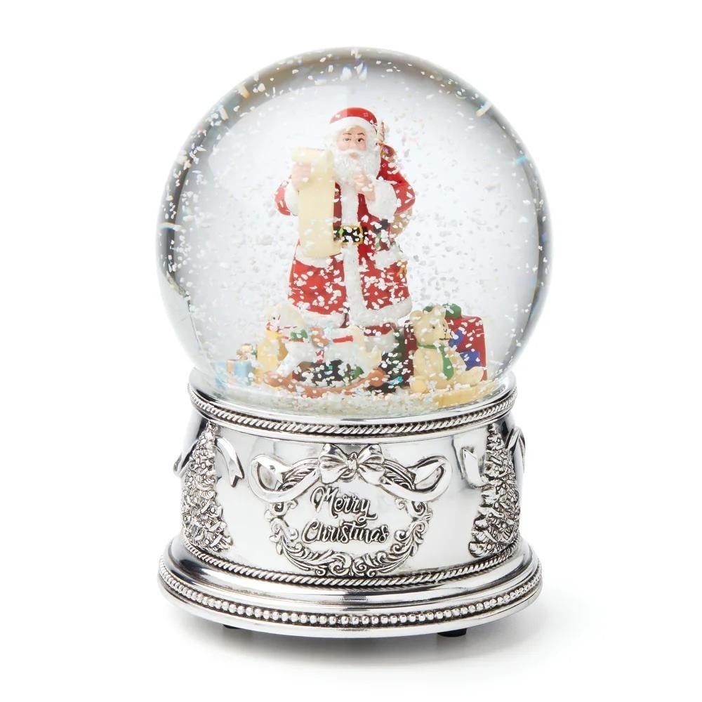 Winter Traditions Santa Jingle Bells Musical Snow Globe: Winter Traditions Santa Jingle Bells Musical Snow Globe Celebrate the magic of the season with the Winter Traditions Santa Musical Snow Globe. Crafted from resin and glass, this charming piece capture