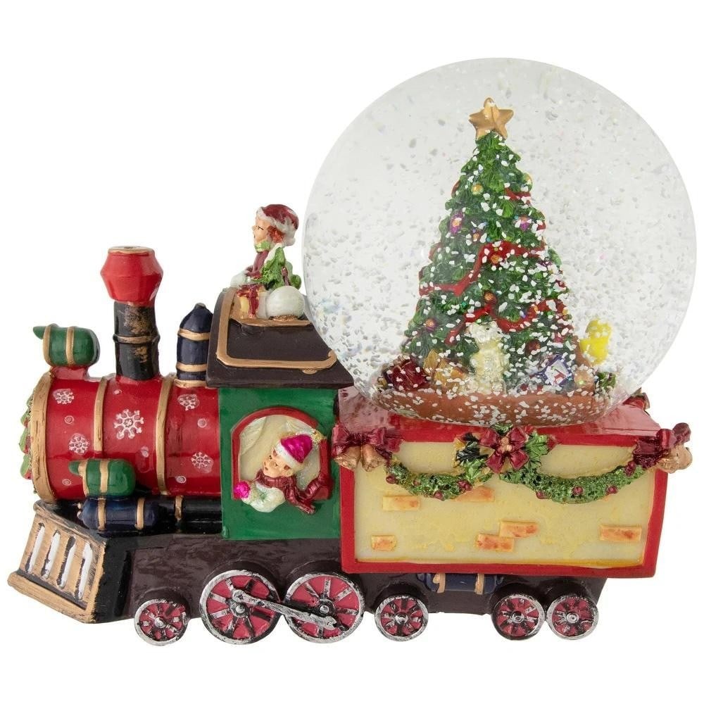 Musical Christmas Train Snow Globe: Musical Christmas Train Snow Globe Bring the magic of Christmas to your home with this festive Musical Train Snow Globe. Inside the globe, a decorated Christmas tree with presents creates a charming h