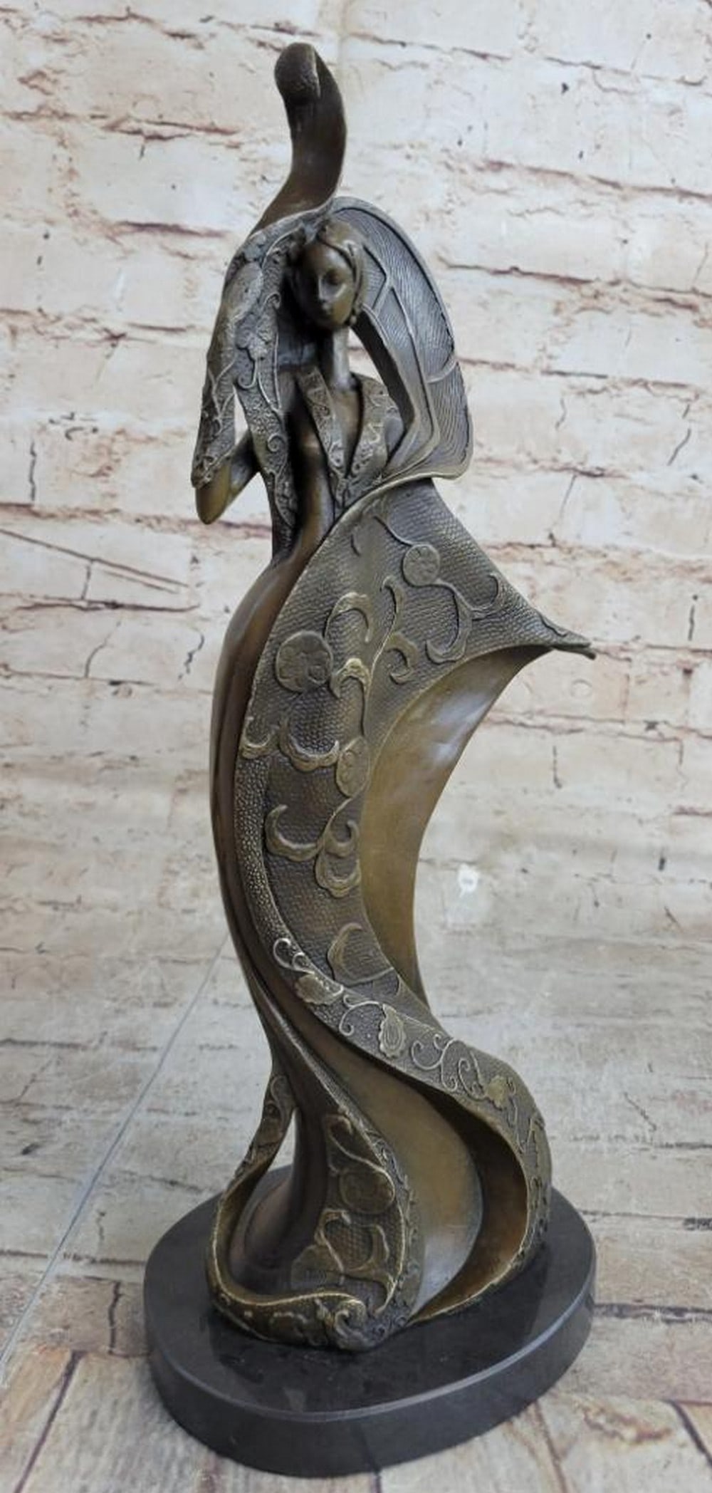 'Fashion Girlin. - Original Bronze Sculpture by Mavchi - 13.5in. x 5in.: Fashion Girl - Original Bronze Sculpture by Mavchi - 13.5 x 5 This breathtaking bronze artwork, titled Fashion Girl, is a true masterpiece that showcases exceptional craftsmanship and museum-quality