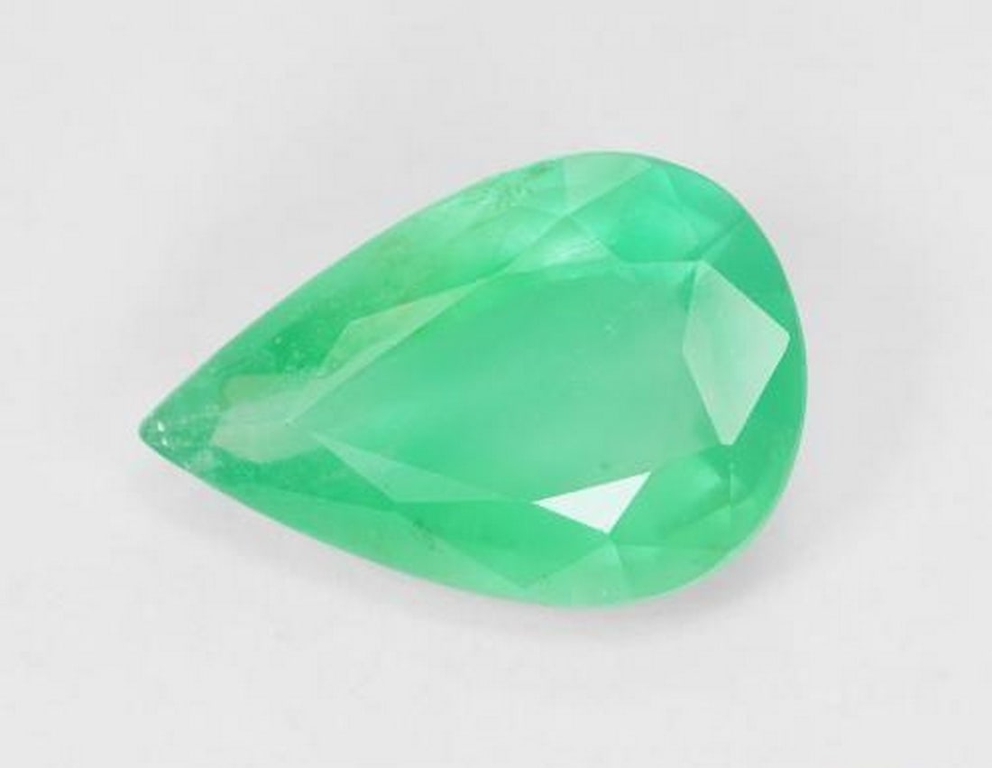 3.54ct Pear Cut Light Green Emerald: 3.54ct Pear Cut Light Green Emerald A pear-shaped, light green emerald with SI clarity and oiled for enhanced color. Known for promoting growth, harmony, and emotional balance, this Zambian gem is