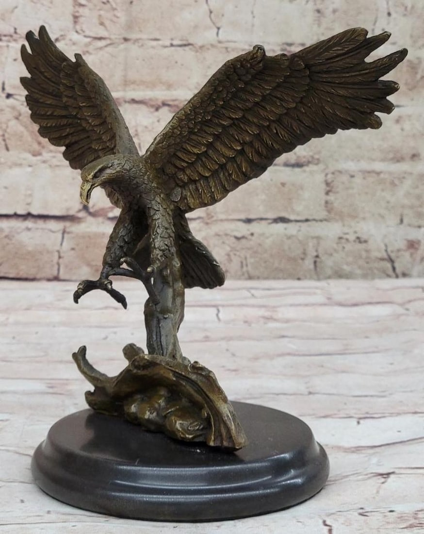Bronze Eagle Inspired Sculpture by Barye - 8" x 9": Bronze Eagle Inspired Sculpture by Barye - 8" x 9" This captivating bronze sculpture by the renowned artist Barye beautifully captures a small eagle descending with grace and power, poised