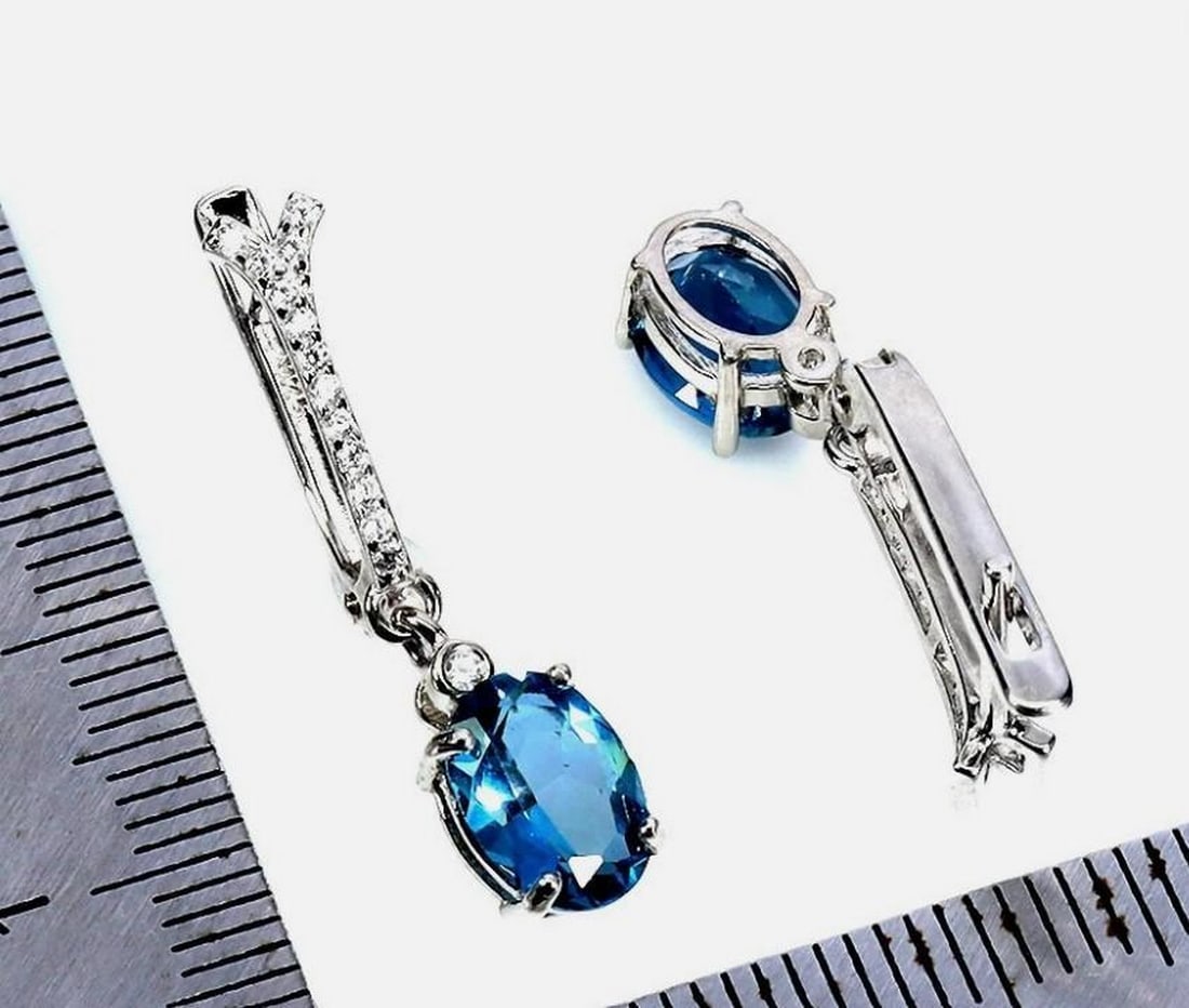 925 Sterling Silver Earrings Oval London Blue Topaz 8x6mm Gemstone Jewelry: Up for auction. Add a pop of color to your outfit for a night out. The perfect gift for someone special or for yourself. Enjoy a pair of these 925 Sterling Silver Blue Topaz Earrings. Base Metal: Ster