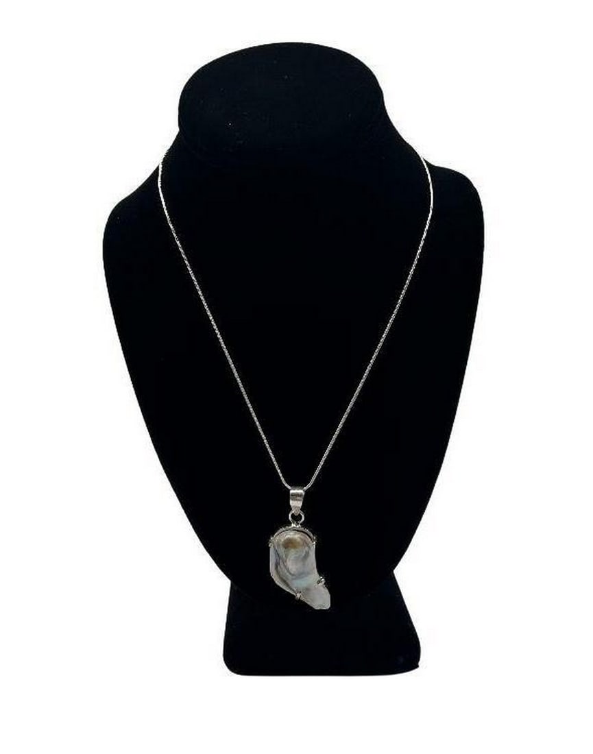Lavender Biwa Pearl Pendant Necklace: Lavender Biwa Pearl Pendant Necklace This pearl pendant is 1.97" in length hanging on a 925 Sterling silver chain. It is a white pearl with a lavender tint. Chain Length: 18" View Photos For F