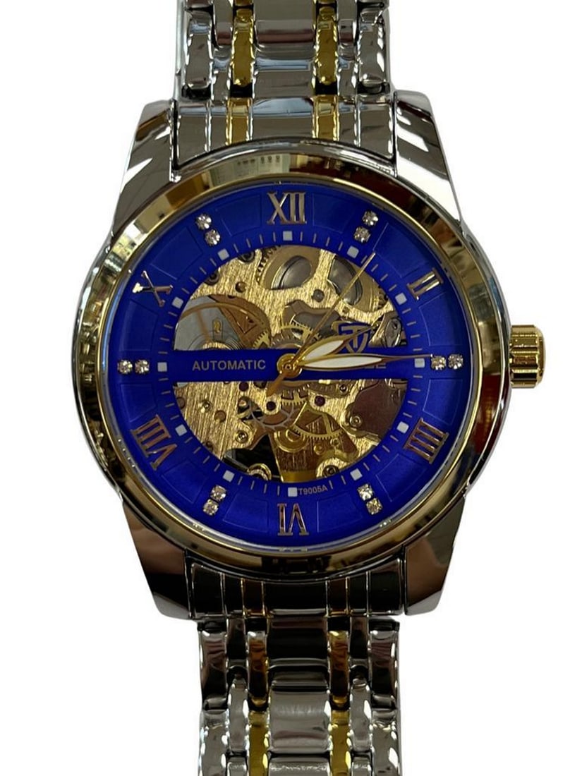 Men's Luxurious Stainless Steel Automatic Skeleton Watch With Blue Dial: Men's Luxurious Stainless Steel Automatic Skeleton Watch With Blue Dial Introducing the Men's Luxurious Stainless Steel Automatic Skeleton Watch With Blue Dial—a timepiece that combines soph