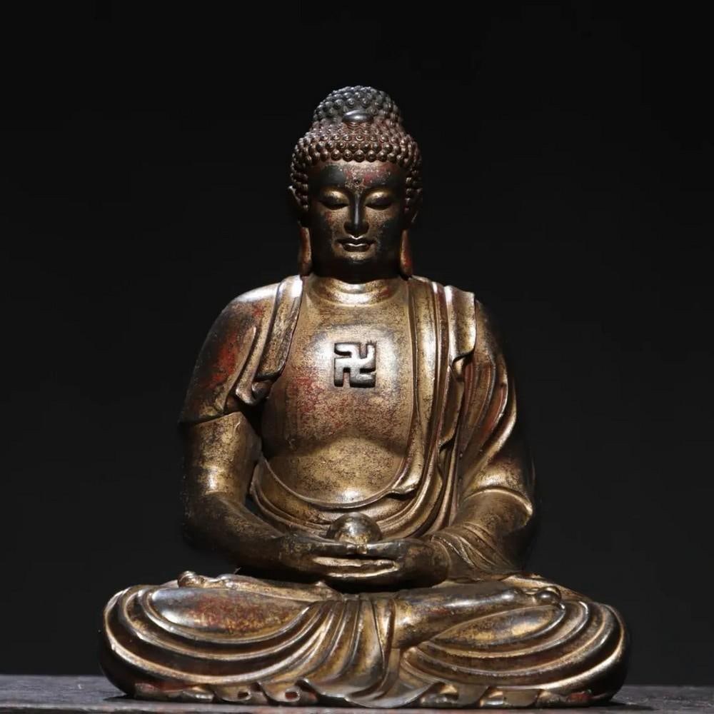 Pure Copper & Gilt Sakyamuni Buddha Statue: Pure Copper & Gilt Sakyamuni Buddha Statue This Pure Copper & Gilt Sakyamuni Buddha Statue depicts the historical Buddha in a tranquil seated pose, symbolizing peace and enlightenment. Crafted
