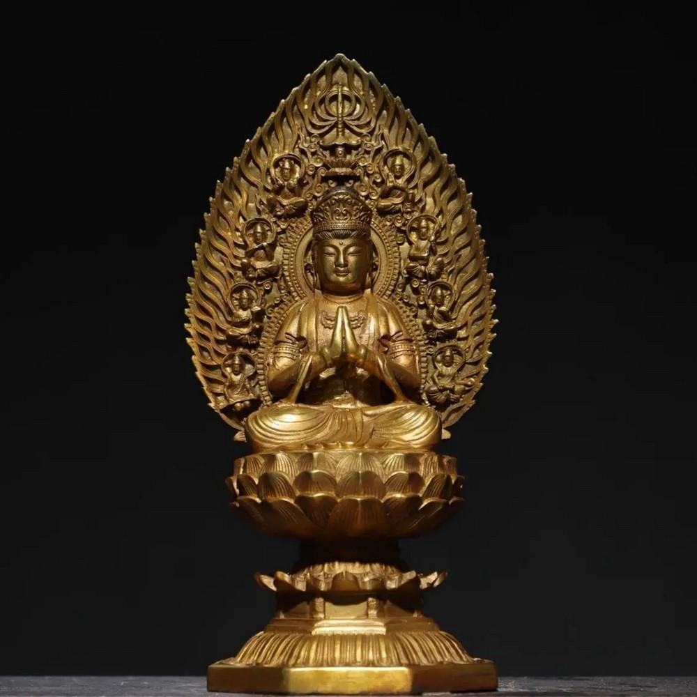 Pure Copper Backlit Guanyin Bodhisattva Buddha Statue: Pure Copper Backlit Guanyin Bodhisattva Buddha Statue This stunning statue of Guanyin Bodhisattva is crafted from pure copper and features a backlit design that enhances its serene presence. The intri