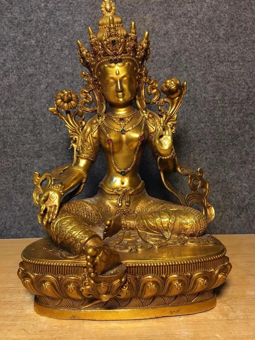Antique Chinese Handcrafted Copper Guanyin Bodhisattva Statue with Gemstone Inlay: Antique Chinese Handcrafted Copper Guanyin Bodhisattva Statue with Gemstone Inlay This rare and exquisite antique statue depicts Guanyin Bodhisattva, meticulously handcrafted from copper and adorned w