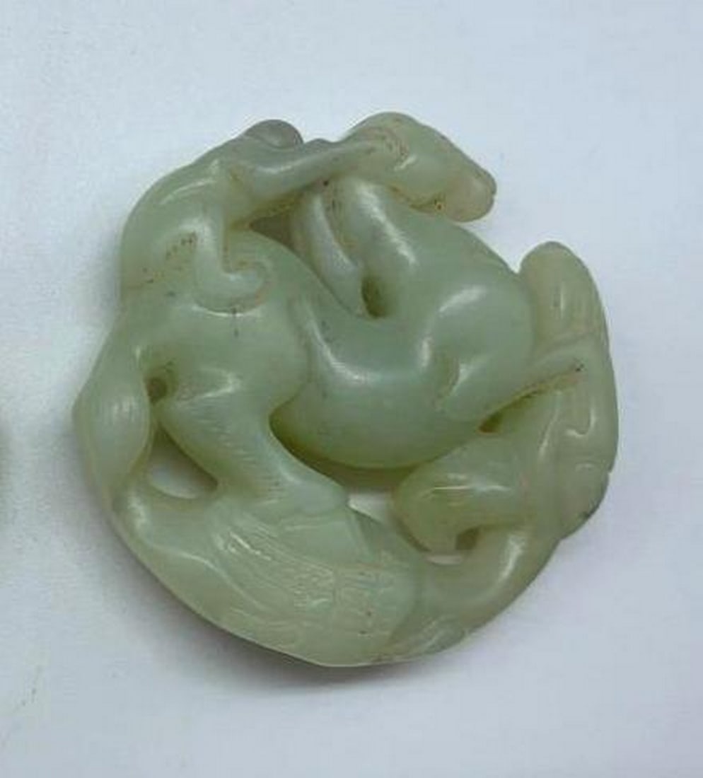 2 White Jade Toggles Featuring a Phoenix And a Monkey Riding a Horse (1 of 1)