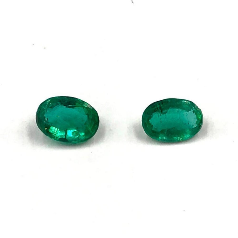 Efficacious Oval Faceted Emerald, 2 pieces - 1.49ct Total Weight: Efficacious Oval Faceted Emerald, 2 pieces For many, emerald is considered to be the symbol of rebirth. It is also believed to represent good fortune, youth, balance, growth, peace, and foresight. Siz