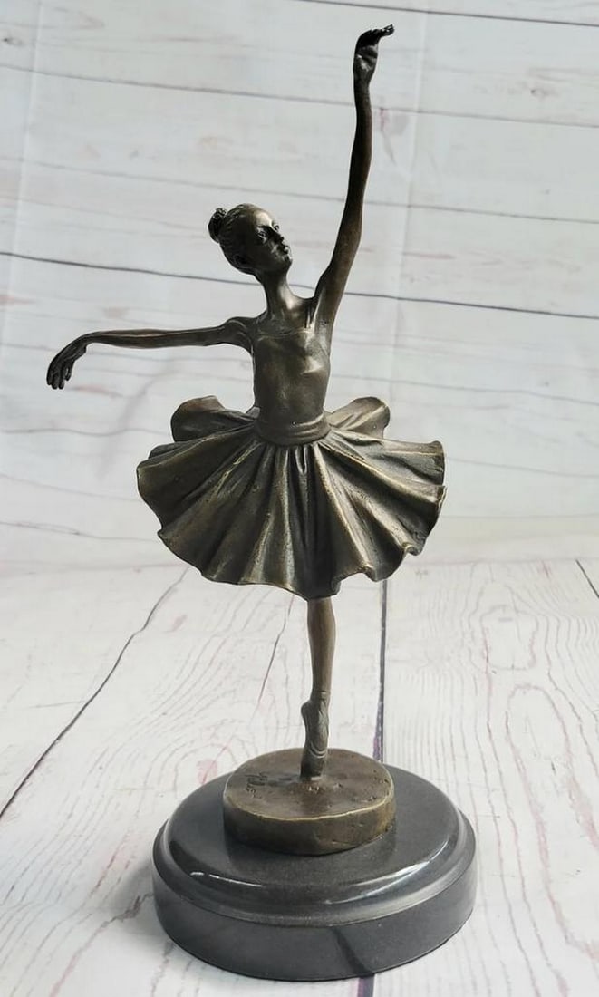 Ballerina in Motion Original Bronze Statue - 12" x 8": Ballerina in Motion Original Bronze Statue - 12" x 8" This exquisite bronze sculpture portrays a highly skilled prima ballerina engaging in a mesmerizing performance. Skillfully showcasing