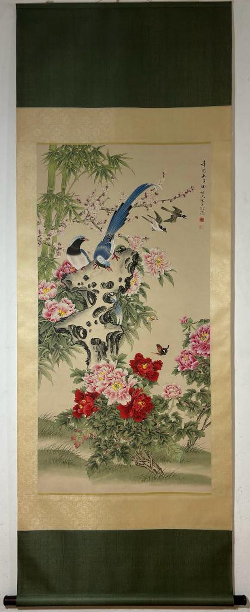 Inspired Joyful Encounter Scroll Painting: Inspired Joyful Encounter Scroll Painting In this lively and richly detailed scroll painting inspired by Tian Shiguang, a group of magpies gathers atop a weathered tree trunk surrounded by an elegant 