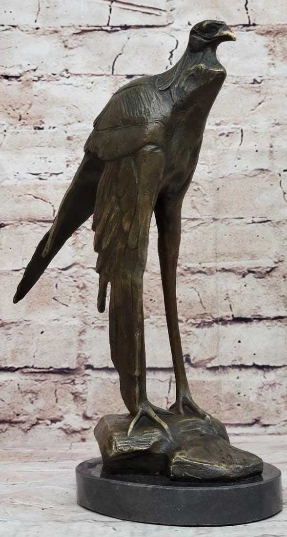 Moigniez Inspired Long Legged Bird of Prey Bronze Sculpture - 10" x 9": Moigniez Inspired Long Legged Bird of Prey Bronze Sculpture - 10" x 9" This Bronze Piece is signed by Moigniez a famous French artist. This Bronze Sculpture is of a Secretary Bird. Standing ta