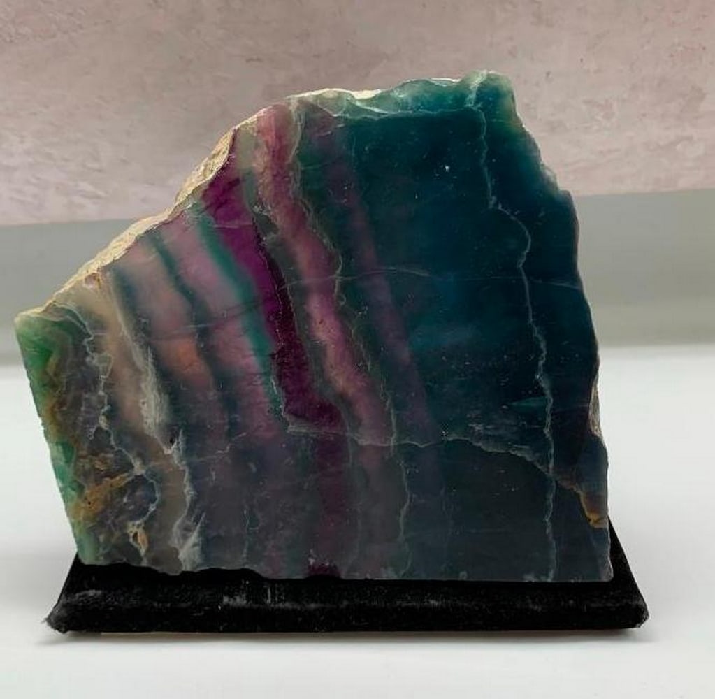 Natural Color Fluorite Section Quartz Crystal Sheet Mineral Specimen: Natural Color Fluorite Section Quartz Crystal Sheet Mineral Specimen. This captivating mineral specimen showcases vibrant, translucent bands of color. Renowned for its harmonizing and cleansing energy