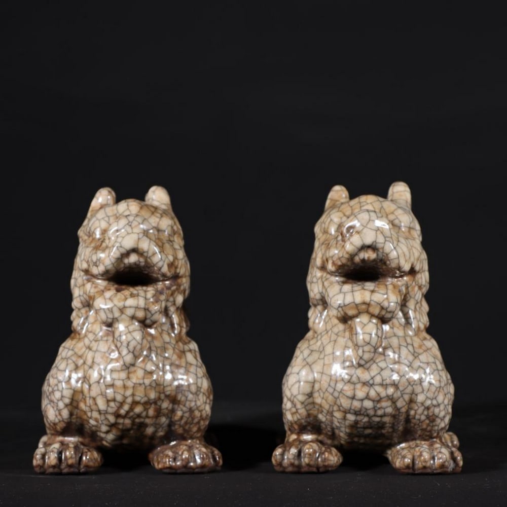 Pair of Old Collection Song Dynasty Ge Kiln Kylins: Pair of Old Collection Song Dynasty Ge Kiln Kylins A rare and finely crafted pair of Kylins from the Song Dynasty, produced at the esteemed Ge kiln. Each piece features the mythical Kylin, a symbol of