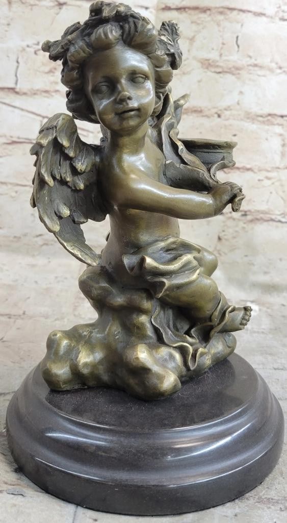 Cherub Candle Holder Bronze Sculpture Inspired by Moreau - 8.5'' x 5'': Cherub Candle Holder Bronze Sculpture Inspired by Moreau - 8.5" x 5" This charming bronze candle holder features a delightful young cherub tenderly cradling a spiraling plant while perched on a 