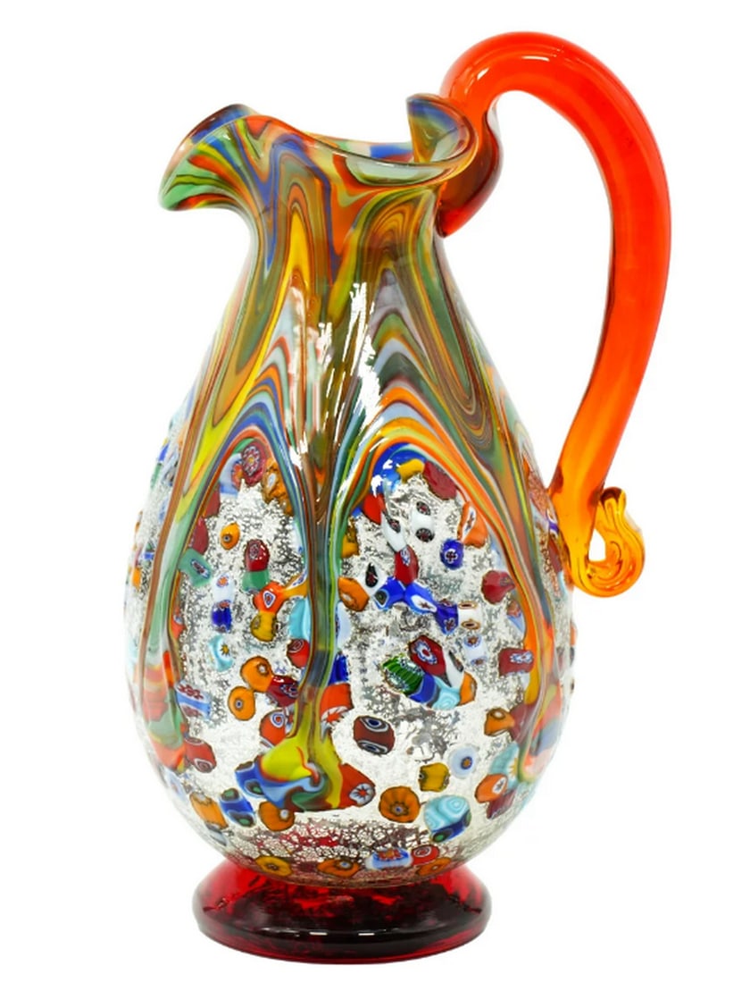 Serenity Pitcher – Murano Glass with Millefiori and Silver Accents: Serenity Pitcher – Murano Glass with Millefiori and Silver Accents This carafe, skillfully crafted with glassblowing techniques and adorned with elegant silver and murrina decorations, is a true wor