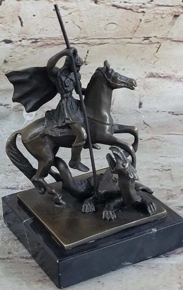 St. George Dragon Slayer Catholic Bronze Sculpture: St. George Dragon Slayer Catholic Bronze Sculpture Ladies, have you always dreamed of having a Knight in Shining Armor sweep you off of your feet? Gentlemen, do you long for adventure and wish that yo