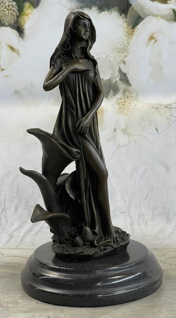 Gaia Mother Earth Bronze Sculpture: Gaia Mother Earth Bronze Sculpture The energy flows from the luscious green earth through the soles of her feet and travel through her body. She is a nymph of the water and woods. She connects with th