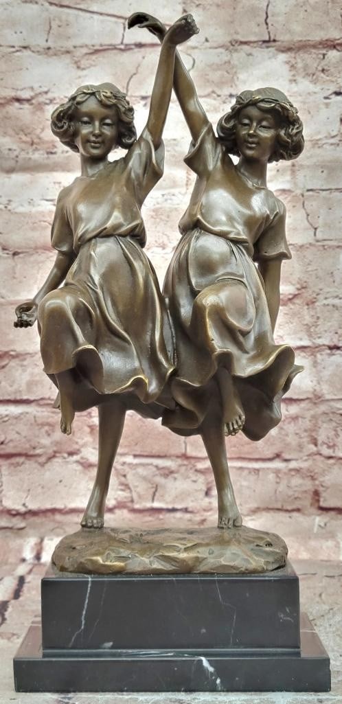 Twin Dancing Girls Bronze Statue - 13.5'' x 6'': Twin Dancing Girls Bronze Statue - 13.5" x 6" This bronze statue depicts two young dancers posed in synchronized movement, with flowing lines and balanced composition that emphasize grace,
