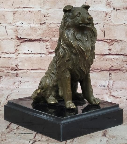 Gentle Companion: Bronze Collie Dog Statue: Gentle Companion: Bronze Collie Dog Statue This charming bronze statue portrays a loyal Collie dog sitting attentively with its mouth slightly open, capturing the breed's friendly and intelligent natu