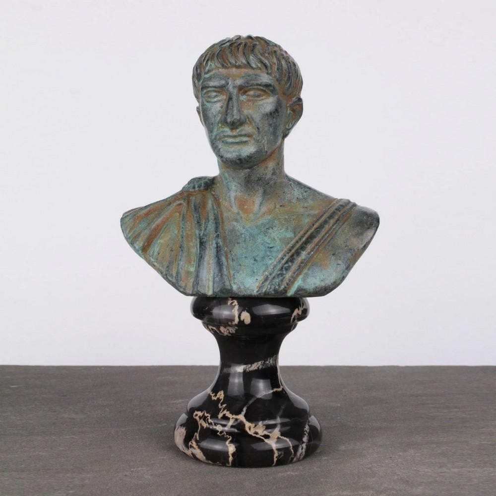 Trajan Bust Bronze Sculpture with Green Patina - (2.2lbs): Trajan Bust Bronze Sculpture with Green Patina - (2.2lbs) Inspired by the marble original in the Vatican Museums, this bust depicts Emperor Trajan with his iconic bare chest. Crafted in copper-zinc al