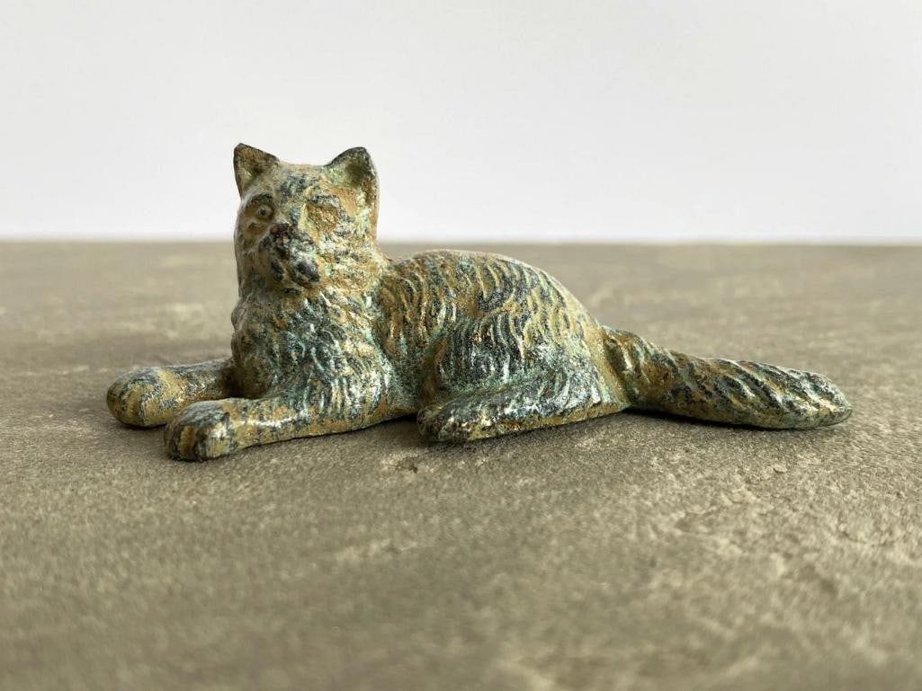Lying Kitten Bronze Statuette in Aged Copper Finish - (0.9lbs): Lying Kitten Bronze Statuette in Aged Copper Finish - (0.9lbs) This sweet bronze kitten rests in a peaceful pose, brought to life with intricate carvings and a vintage green patina. Made from copper-z