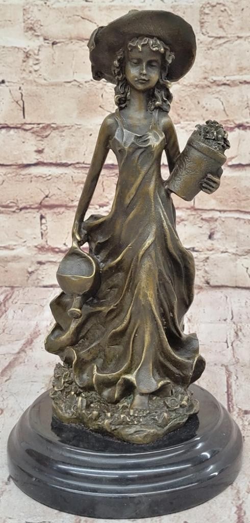 19th Century Girl Wearing Sun Hat Original Bronze Statue - 10.5'' x 5.5'': 19th Century Girl Wearing Sun Hat Original Bronze Statue - 10.5" x 5.5" This serene bronze sculpture by Jean Patoue captures a young girl tending to her garden, evoking innocence and tranquility