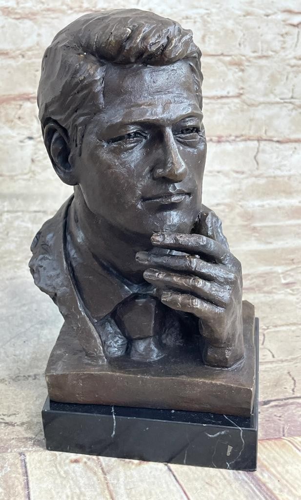 Bill Clinton Bronze Bust by Mavchi - 10'' x 6.5'': Bill Clinton Bronze Bust by Mavchi - 10" x 6.5" This distinguished bronze bust of President Bill Clinton adds a touch of intelligence and patriotism to any desk or mantle. Standing at 10 inches 