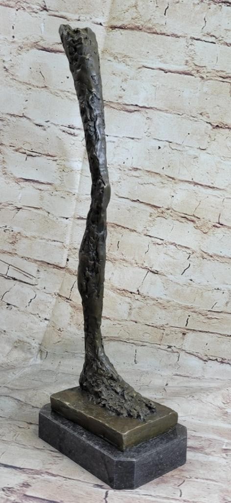 Abstract Human Leg Inspired Bronze Statue - 17'' x 6'': Abstract Human Leg Inspired Bronze Statue - 17" x 6" Introducing a captivating bronze figurine inspired by the Mid Century Modern era and the renowned artist Gia Cometti. This abstract sculpture