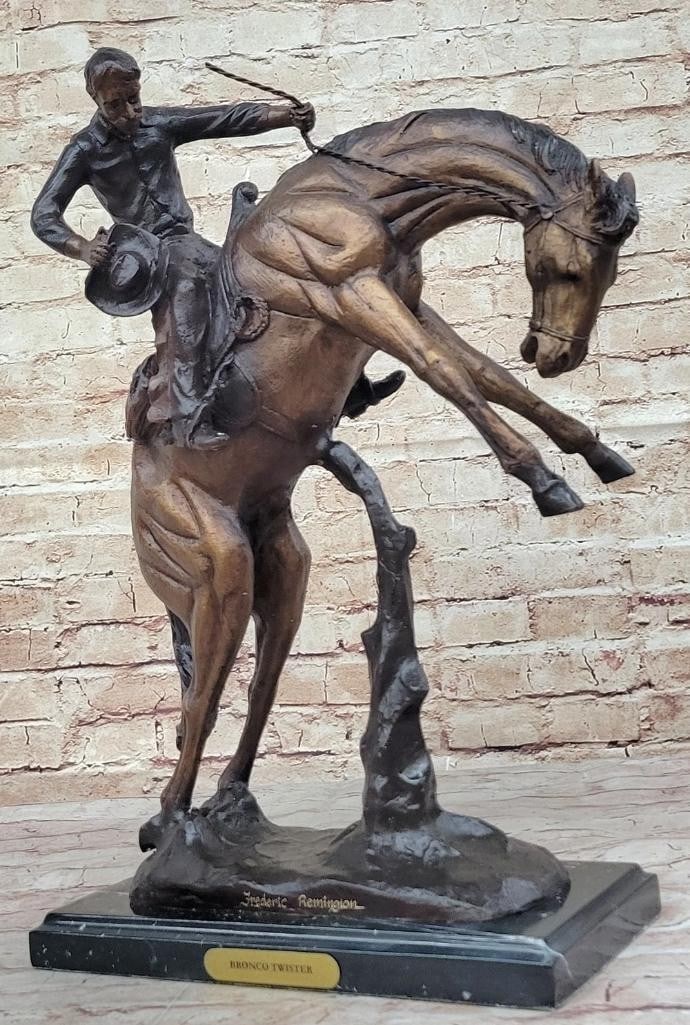 American Cowboy Riding Bronco Inspired Bronze Statue - 20'' x 20'': American Cowboy Riding Bronco Inspired Bronze Statue - 20" x 20" Step into the action of the Wild West with this dynamic bronze statue, ''Bronco Buster,'' inspired by Frederic Remington's iconic