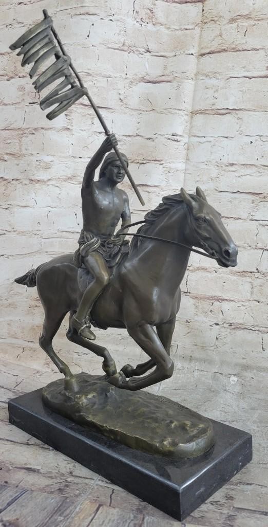 Native American Man On Horse Bronze Sculpture: Native American Man On Horse Bronze Sculpture This Is A Particularly Detailed Sculpture Of A Native American Man On His Horse. The Horse Is Young But Strong And Stands Calmly As The Rider holding a fl