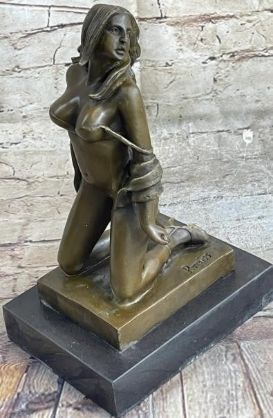 Semi-Nude Bronze Female Reproduction Sculpture: Semi-Nude Bronze Female Reproduction Sculpture Exuding quiet sensuality and poised elegance, this bronze sculpture features a semi-nude female figure gracefully posed on her knees. Her posture, both a