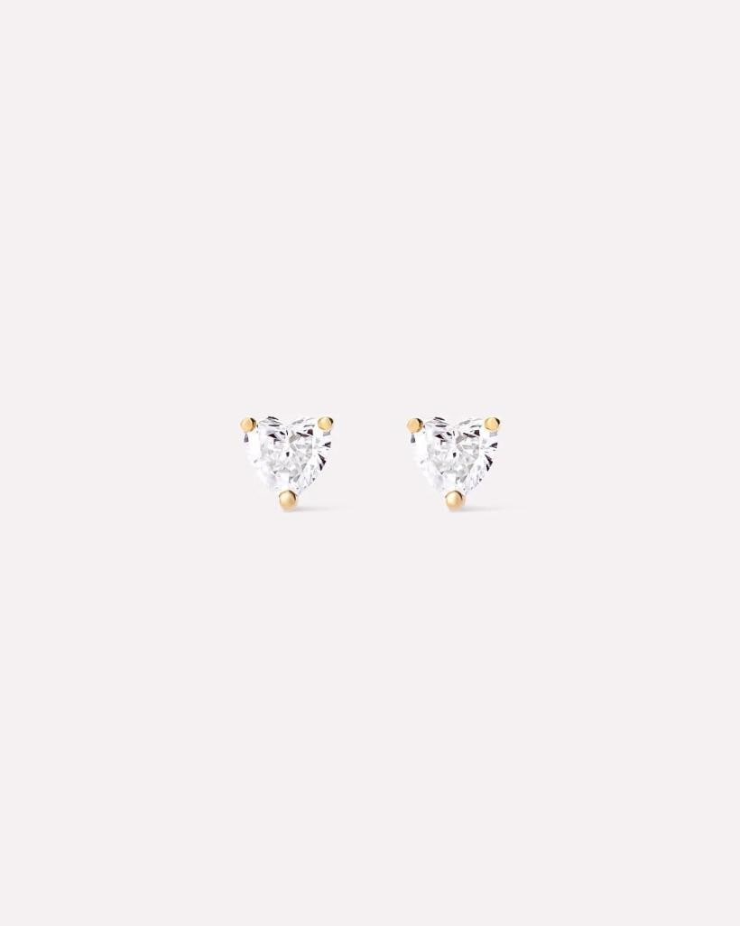 Solid Gold Heart Stud Earrings: Solid Gold Heart Stud Earrings These earrings are crafted from recycled solid yellow gold and feature heart-shaped lab-grown diamonds. Designed for durability, they are resistant to water and tarnish