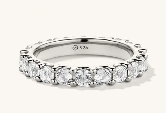 Aurora Sapphire Eternity Band: Aurora Sapphire Eternity Band The Aurora eternity ring features a continuous band of lab-grown sapphires. Each precision-cut stone is ethically crafted to capture the magic of natural light, set in a